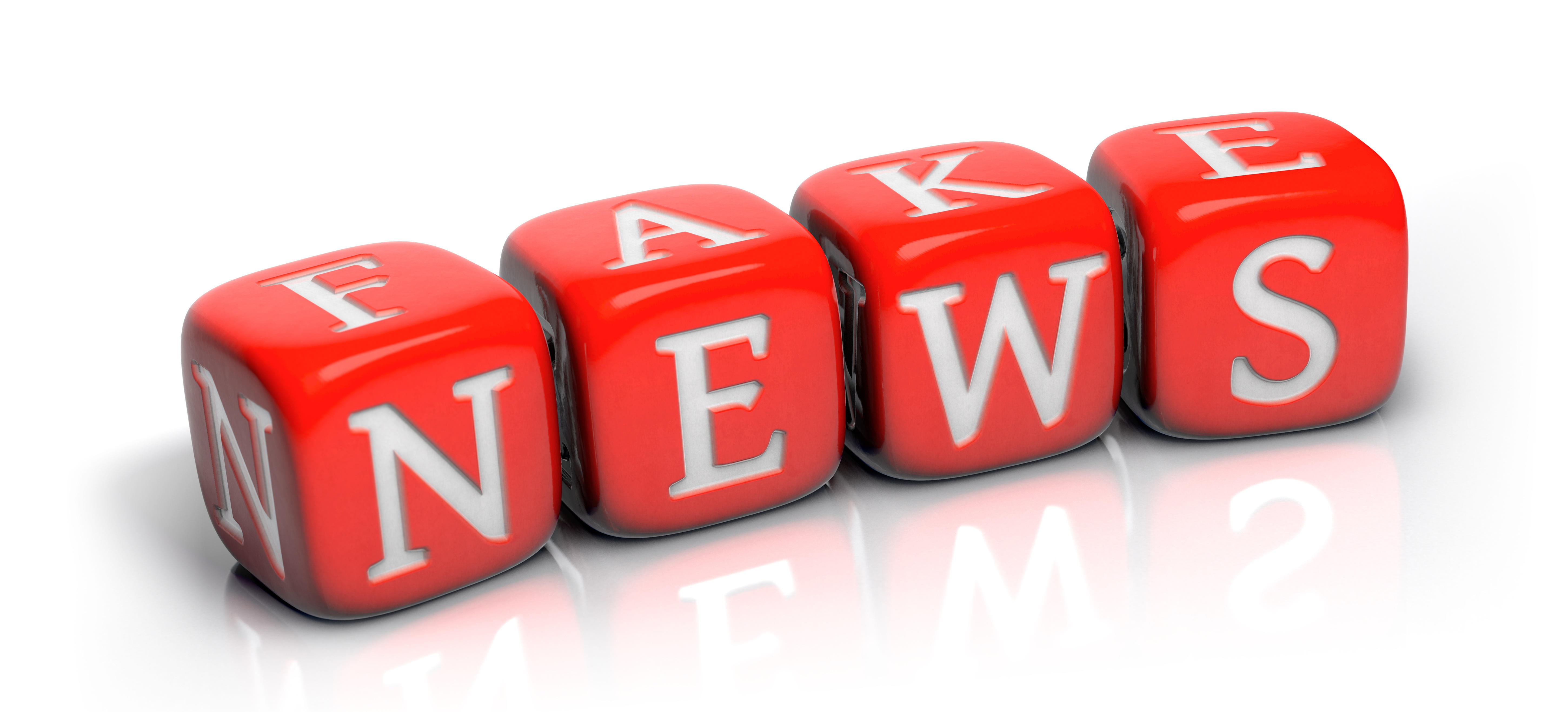 Isolated red letter cubes FAKE NEWS.