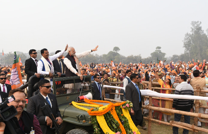 Prime Minister Narendra Modi greets people in Varanasi