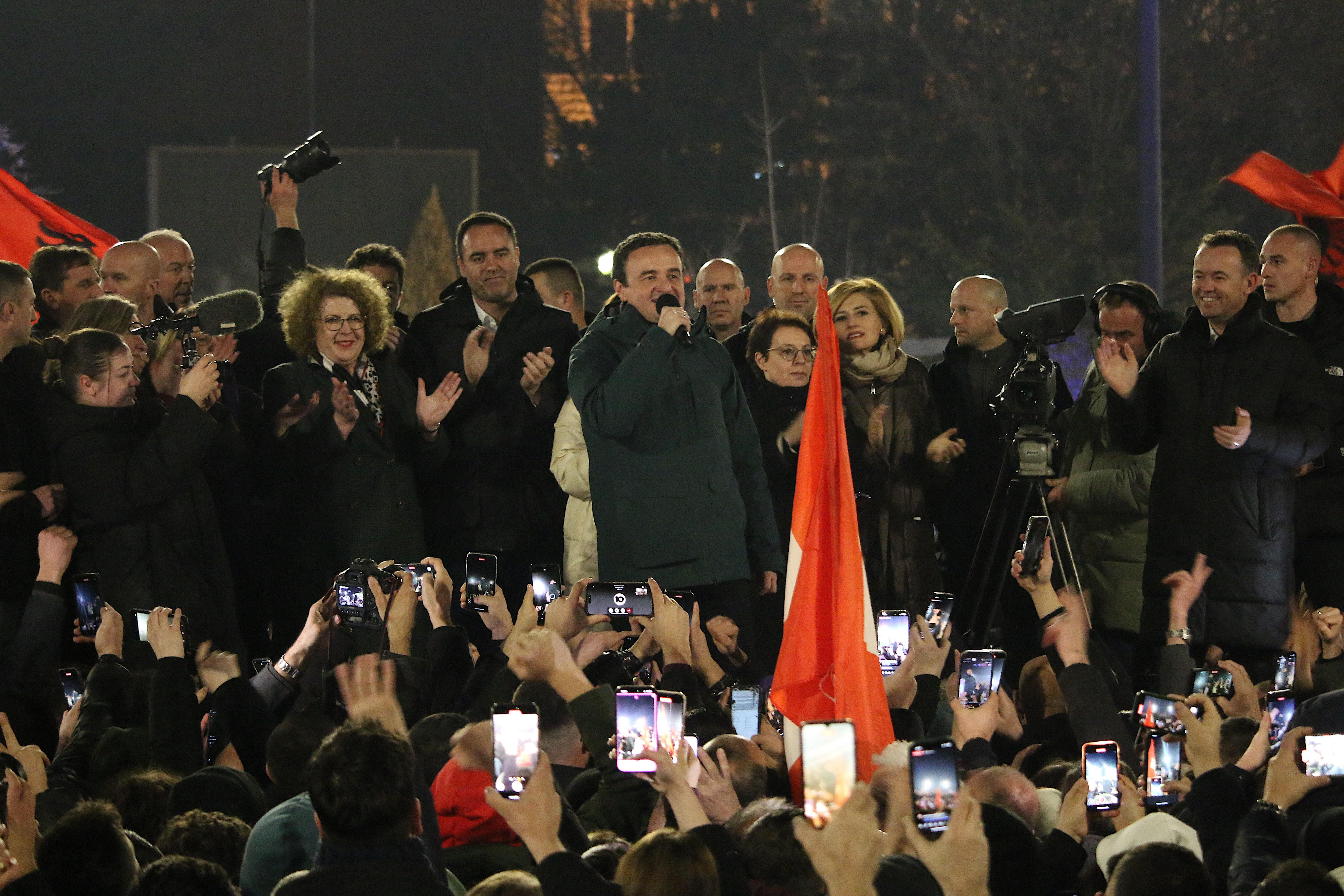 Kosovo's Prime Minister Albin Kurti celebrates with his supporters in front of the government building in Pristina, Kosovo 