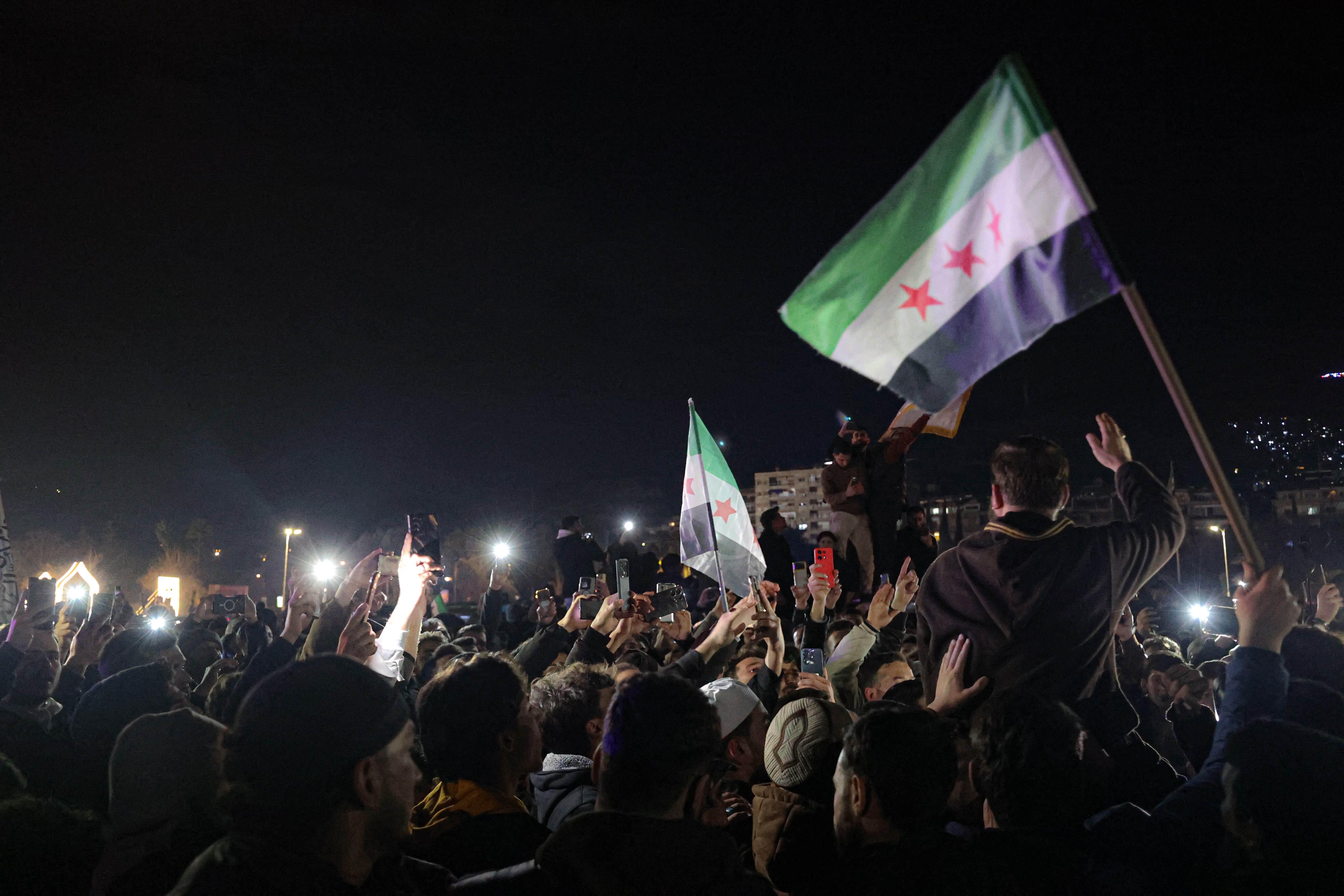 Syrians gather to protest against the attacks carried out by the forces of the ousted Assad regime against members of the General Security Administration in Latakia. 