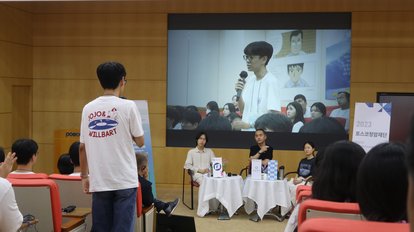 student raising a question