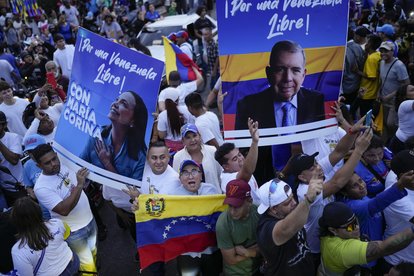 Opposition supporters cheer for presidential candidate Edmundo González and María Corina Machado.
