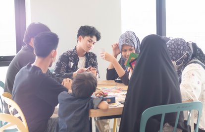 Participants playing Media Literacy card game