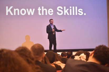 FNF Lebanon Project Manager Kevin Awkar leading a workshop on project management for over 200 advisors.