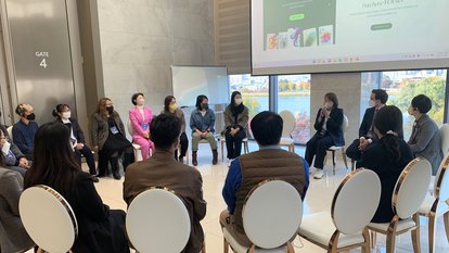 group of people sitting in circle
