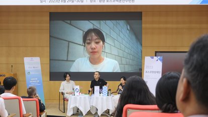 participant raising a question via zoom