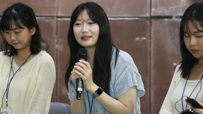 Participant raising a question