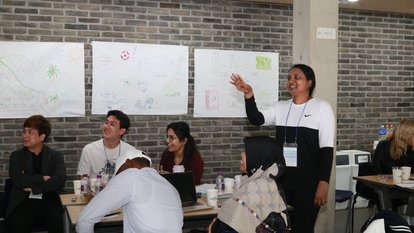 A participant is presenting her group's work