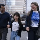 Former Nicaragua presidential candidate Felix Maradiaga reunits with his wife Berta Valle and his daughter Alejandra, walk together after Maradiaga arrived from Nicaragua