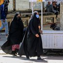 Afgan women walk on a road on the eve of the second anniversary of taking over the government in Kabul, Afghanistan, 14 August 2023. 