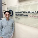 Bugra Kilinc poses outside FNF Vietnam's office