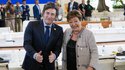 Argentina's President Javier Milei, left, gestures for photographer next to Head of the International Monetary Fund, Kristalina Georgieva