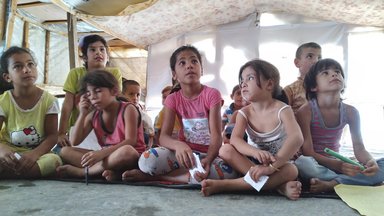 Syrian refugees during school lessons