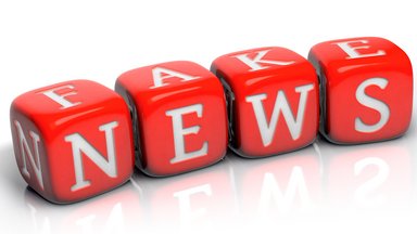 Isolated red letter cubes FAKE NEWS.