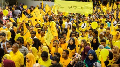 People Rallying on Road