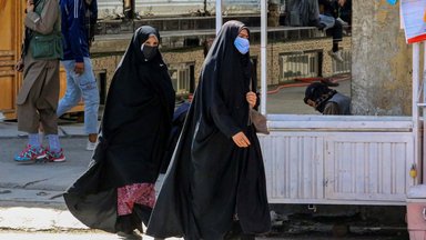 Afgan women walk on a road on the eve of the second anniversary of taking over the government in Kabul, Afghanistan, 14 August 2023. 