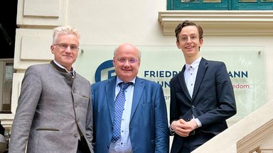 Fritz Kuermayr (right) takes a shot outside FNF Vietnam's office with Austrian Ambassador to Vietnam Hans-Peter Glanzer (middle) and FNF Vietnam Country Director Andreas Stoffers (left)